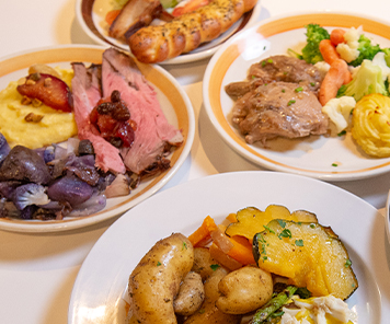 An assortment of plated homestyle comfort dishes