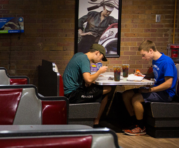 Students eating at The Cellar
