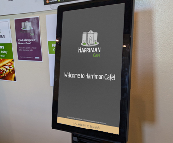 The welcome screen on the TAPAS ordering kiosk in front of Harriman Café