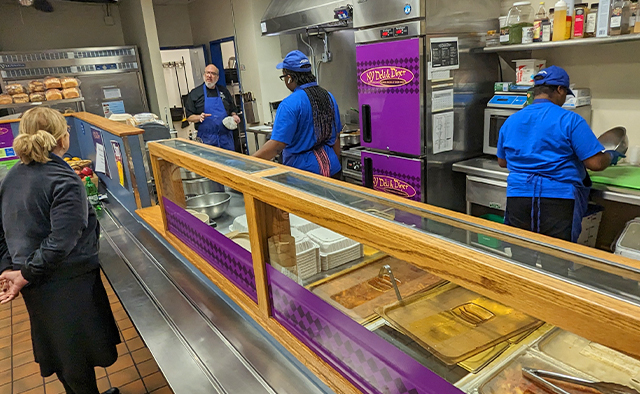Customer ordering from our Mashgiach at the NY Deli counter