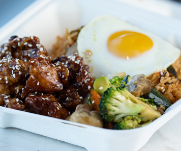 Sesame Chicken with hibachi vegetables and kimchi fried rice with egg from PanAsia