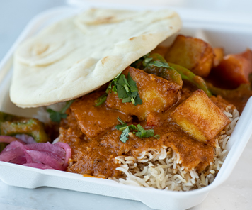 Paneer Tikka Masala with rice and naan from Tikka Table