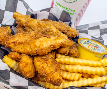 Chicken tenders, crinkle fries and sauce from Fowl Play