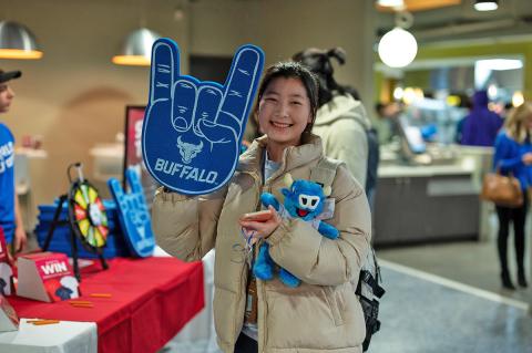 Student with their prizes at the Soccer Event at Crossroads Culinary Center (C3) in Ellicott Complex on North Campus. Photographer: Onion Studio