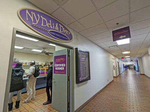 The entrance of NY Deli & Diner in the hallway of Talbert Hall.