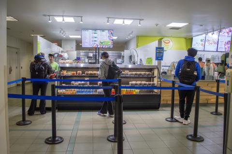 Students lining up at Champa Sushi.