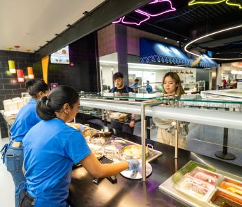 Student ordering from Tikka Table