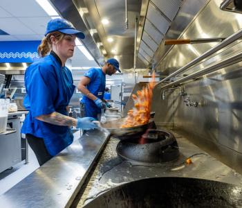 CDS employee cooking