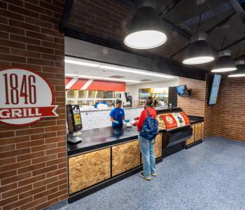 Student ordering from 1846 Grill