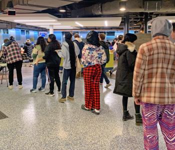 Students lining up to get their unlimited pancakes and sausage at Crossroads Culinary Center (C3)