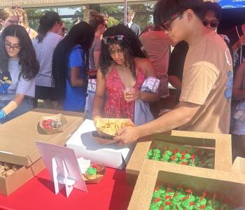 Students getting food at the snack tent