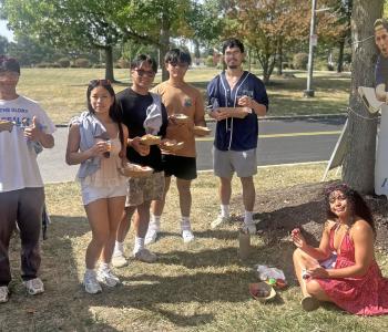 Students posing with their food