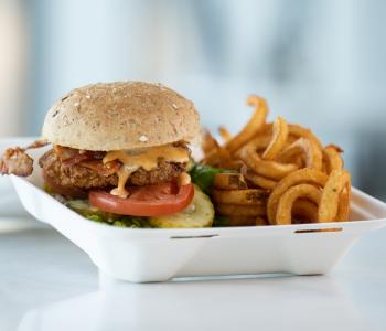 Fried chicken sandwich and fries from 1846 Grill. Photo by Onion Studio.
