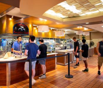 Students ordering food from the Mongolian Grille, a staple of Goodyear Dining Center. Photo by Meredith Forrest Kulwicki.
