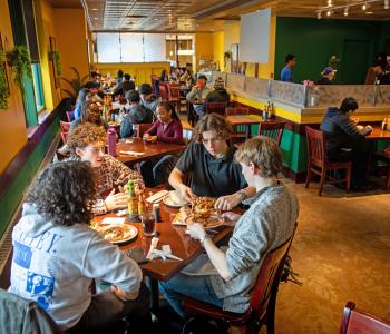 Students eating together at Sabor Latino. Photo by Meredith Forrest Kulwicki.