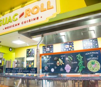 Guac & Roll sign and order counter in Ellicott Food Court. Photo by Douglas Levere.