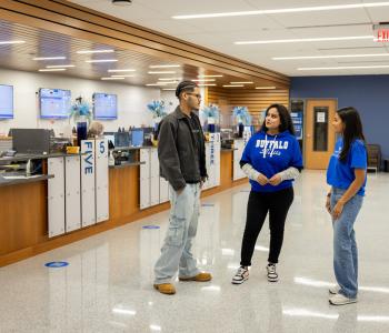 Students chatting in the scatter area of 1Capen. Photo by Meredith Forrest Kulwicki.