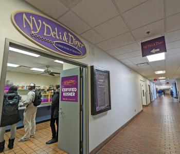 The entrance of NY Deli & Diner in the hallway of Talbert Hall.