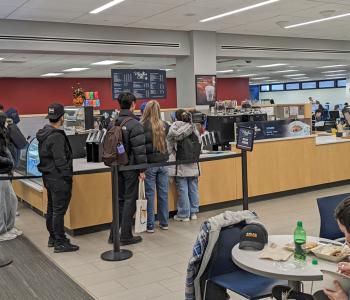 Students in line at Whispers in Silverman Library.