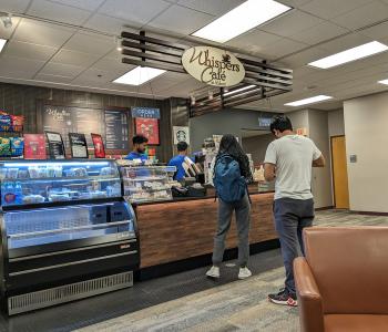 Students in line to order at Whispers Café at Abbott Library.