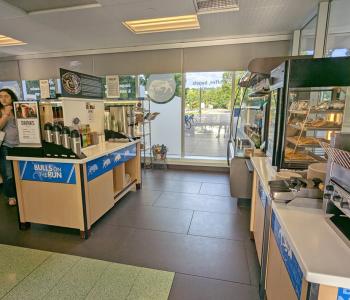 Self serve options at Bulls on the Run at Greiner Hall, including coffee station and breakfast sandwiches