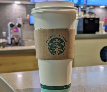 A hot beverage on the Perks waiting counter.