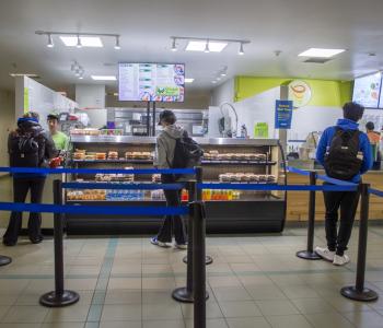 Students lining up at Champa Sushi.