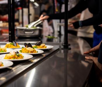 Plates of paella ready to be retrieved. Photo: Meredith Forrest Kulwicki